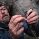 Rob Sparks extracting a black swift from a mist net at Zapata Falls.